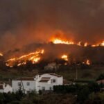 Why are wildfires spreading rapidly across Spain?